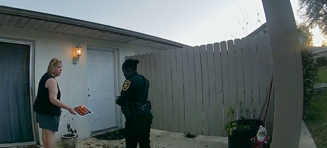 lorincz with a police officer